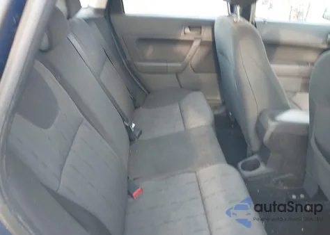 2009 Ford Focus Se z USA, uszkodzony, nr VIN 1FAHP35N69W106473